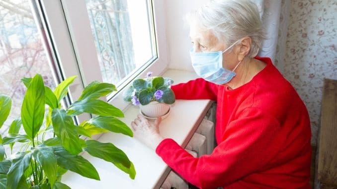 old lonely woman sitting- Mental Wellbeing During a Pandemic