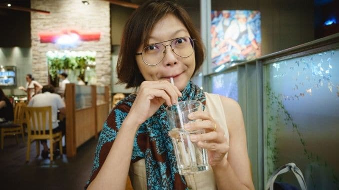 Drinking Water In Restaurant