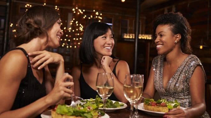 female friends eating dinner