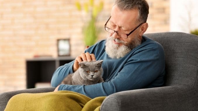 holding cute cat