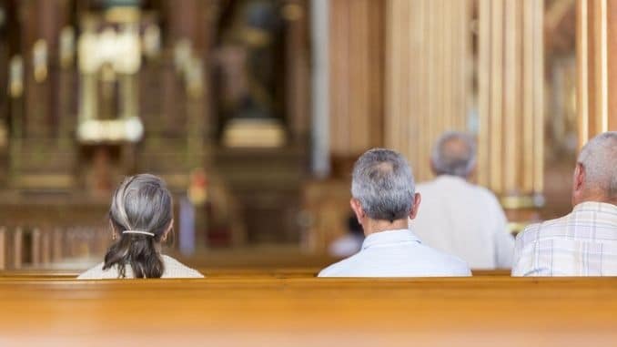 praying at the church