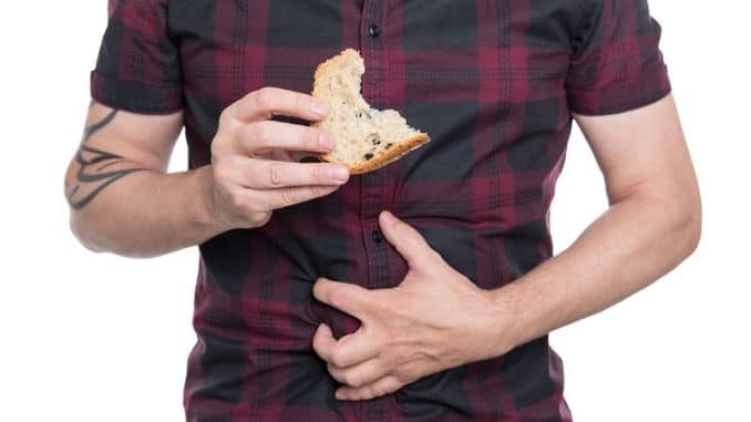 Man holding wheat bread