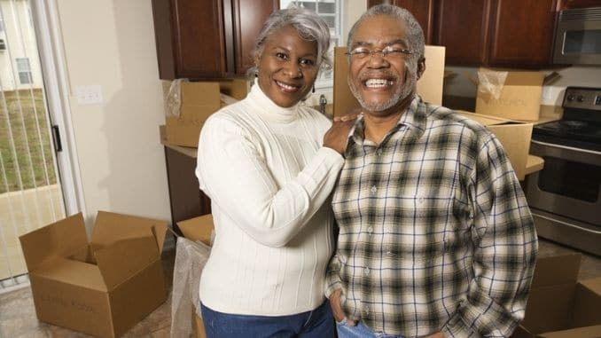 couple standing in kitchen