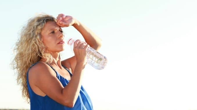 woman with water bottle