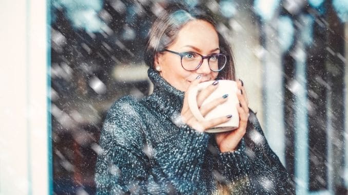 woman-holding-cup-tea