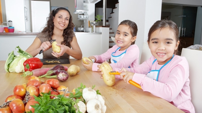 mother-twins-peeling-potatoes