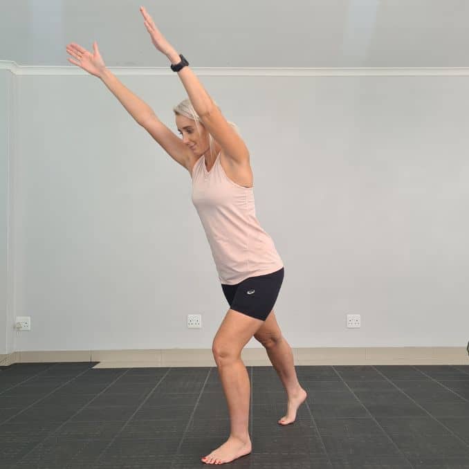 Arm Raises with Toe Tap 1