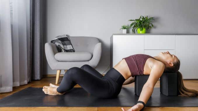 Woman doing yoga exercise