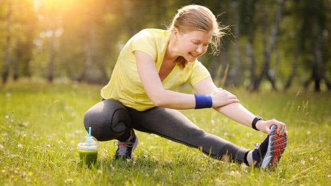 Stretching Hamstring Leg Muscles During Outdoor - Tight Hamstrings